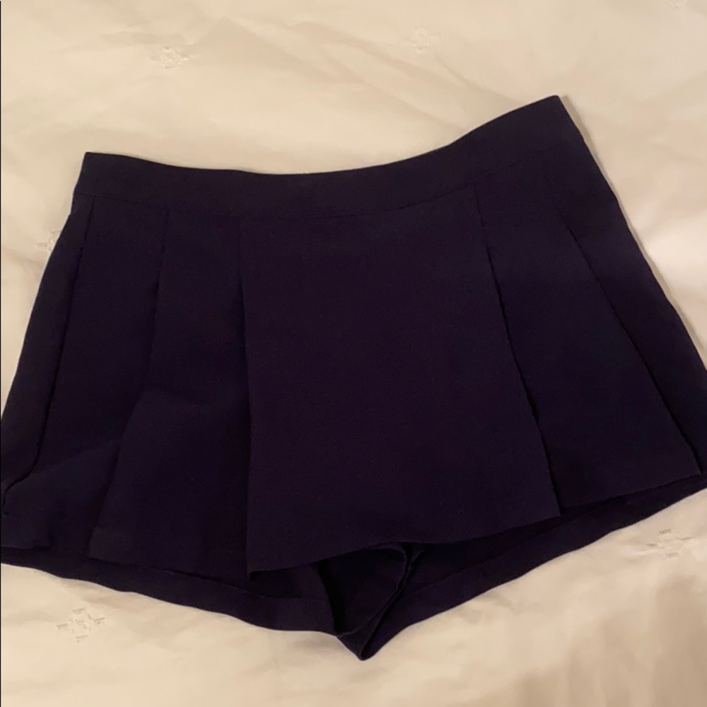 Navy pleated mini skort